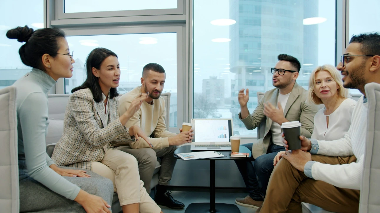 Diverse group of people in a modern office meeting